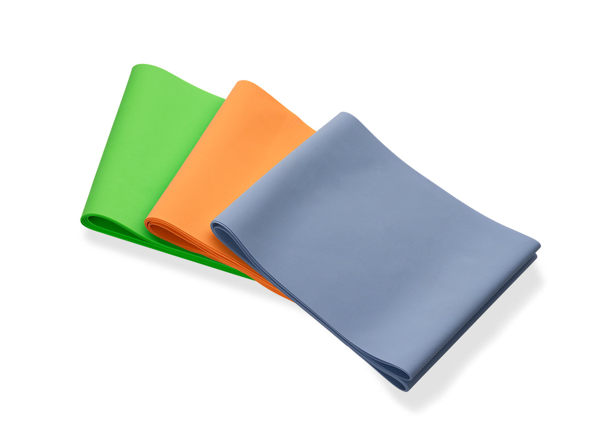Drei Gymnastikbänder von Black Forest Health in Blau, Orange und Grün, Widerstandsstufen Level 1, 3 und 5